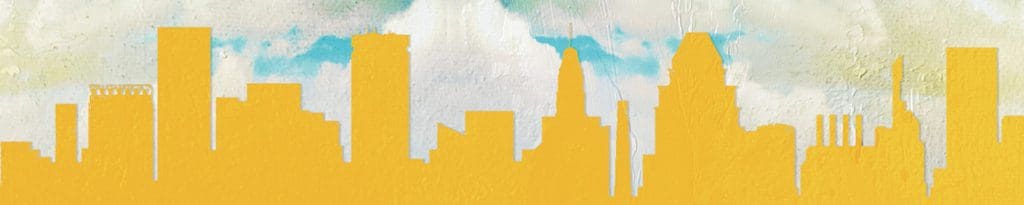 paper cutout collage of baltimore skyline