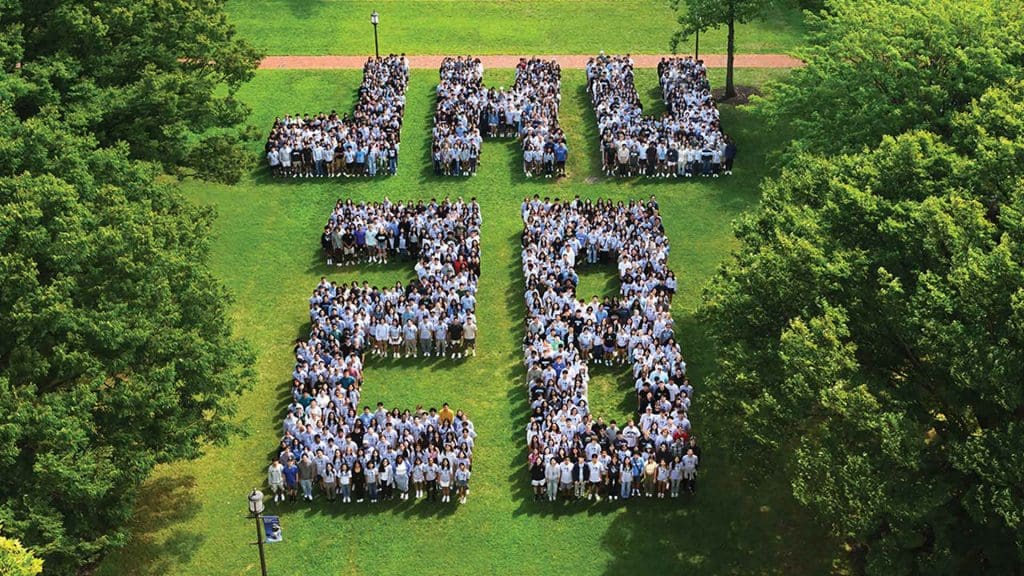 overhead view of students assembled into their class year "28"