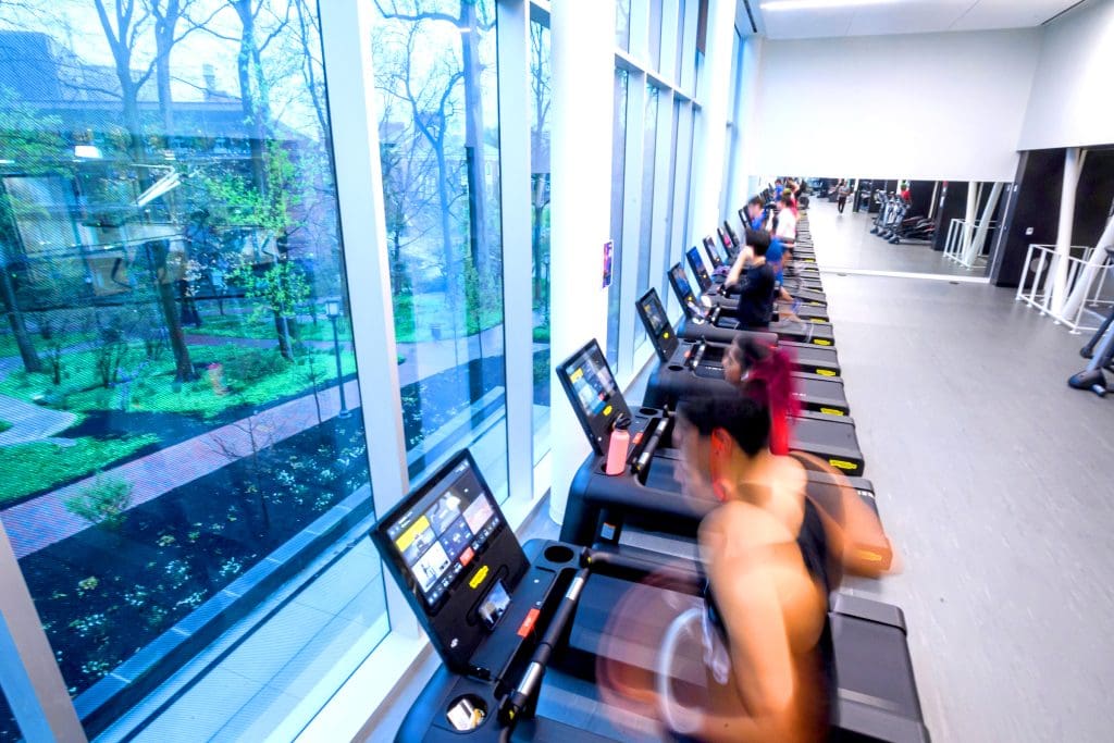Multiple people on treadmills in the Rec Center