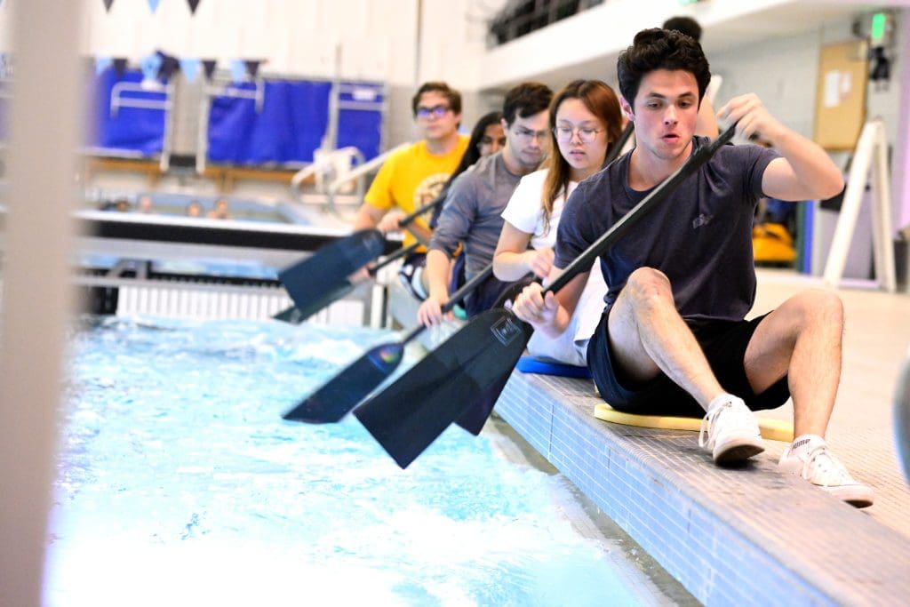 Students kayaking in the Rec Center pool