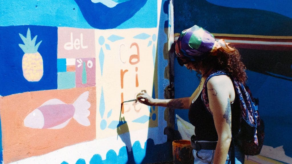 Local artist working on mural in Cartagena, Columbia.