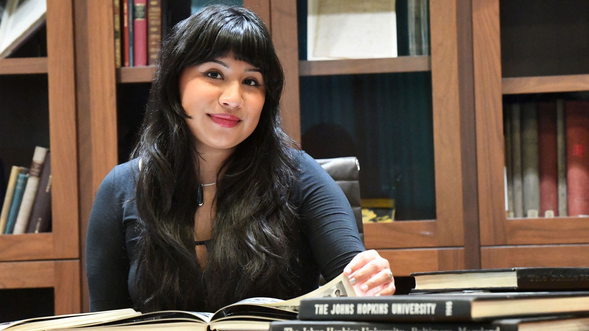 Sandy Monter-Casio with archival Hopkins material.