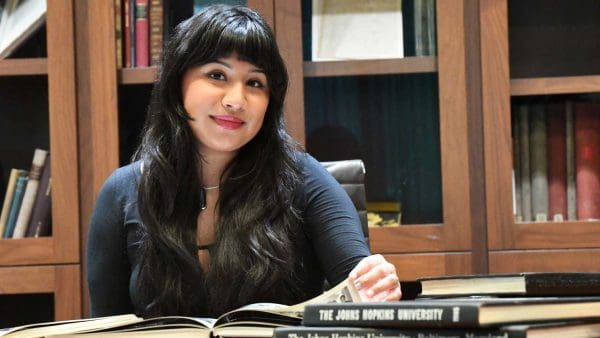 Sandy Monter-Casio with archival Hopkins material.