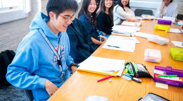 Students in Imagination and Research roll the dice. (Students left to right: Connor Jung, Janice Chang, Vy Trinh, Jessica Lopez Sanchez)